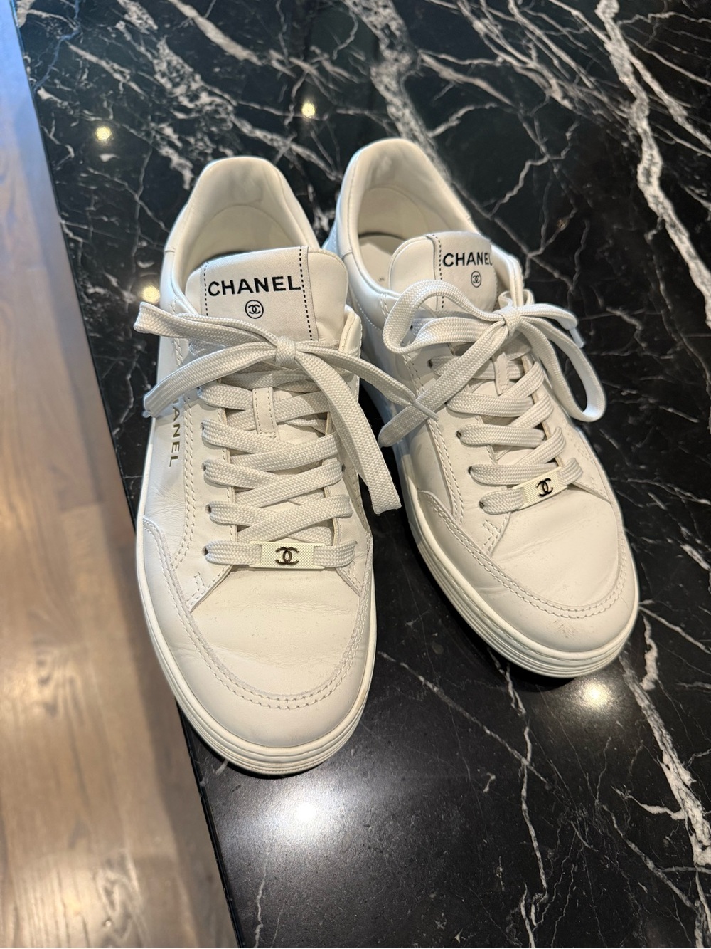 CHANEL White Leather Low-Top Lace-Up Sneakers with CC Hardware
